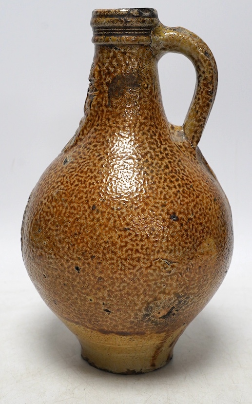 A 17th century Rhenish saltglazed Bellarmine, 23cm. Condition - commensurate with age